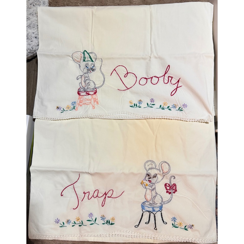 A pair of hilarious vintage pillow cases